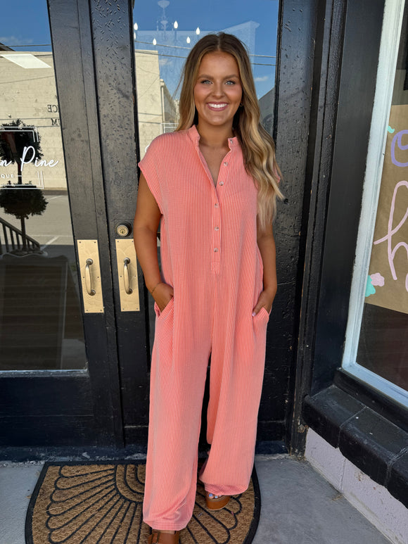 Orange button down jumpsuit