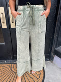 Olive mineral wash exposed seam flare pants