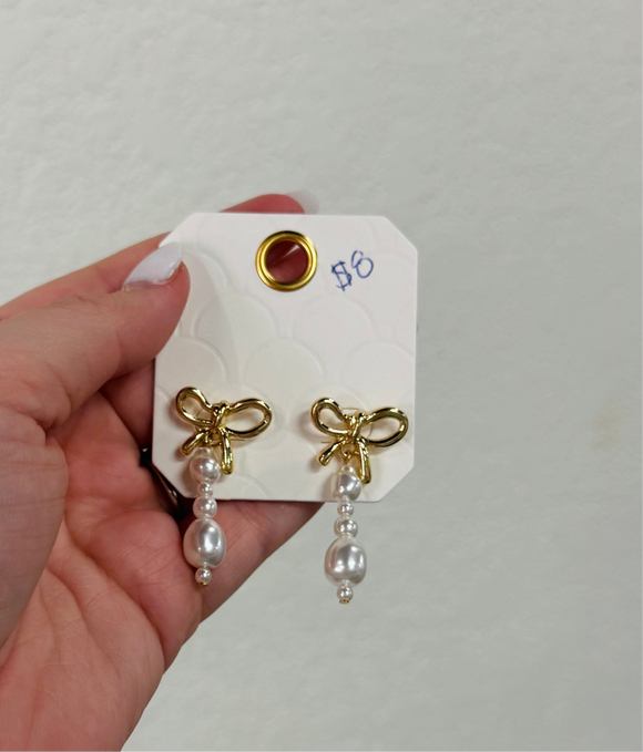 Bow pearl drop earrings