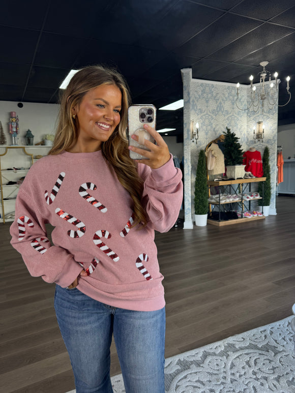 Pink ribbed crew neck with candy cane patches