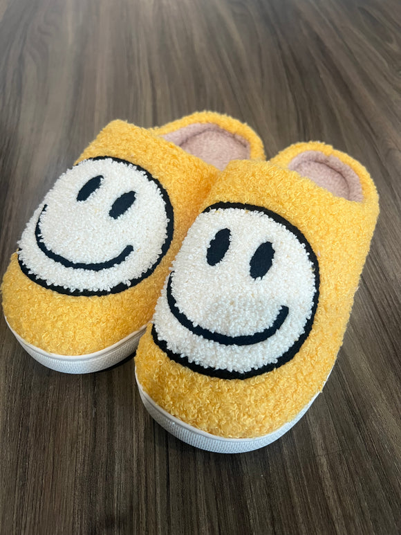 Yellow smiley slippers
