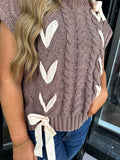 Brown sweater with cream ribbon