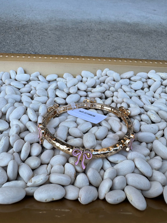 Gold Metal Hammered Stretch Bracelet with Pink Bows