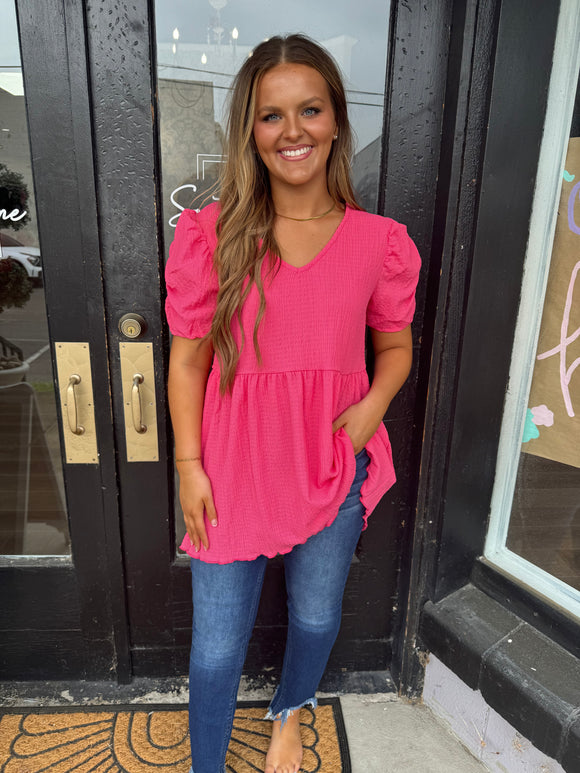 Pink textured puff sleeve blouse