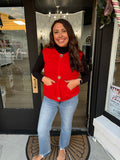 Red sweater vest with gold buttons