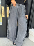 Black faux denim pants