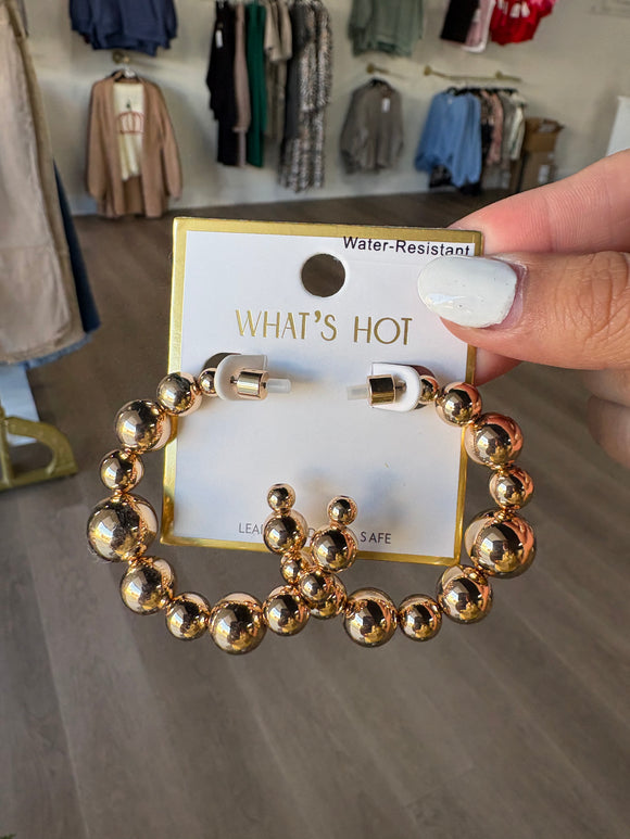 Gold graduated 2” beaded hoop earrings