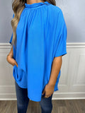 Blue mock neck top