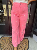 Pink distressed pearl pants