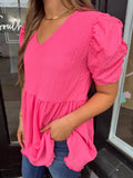 Pink textured puff sleeve blouse