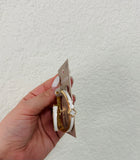 White & gold hoop earrings