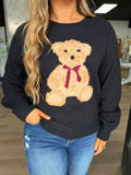 Black teddy bear sweater