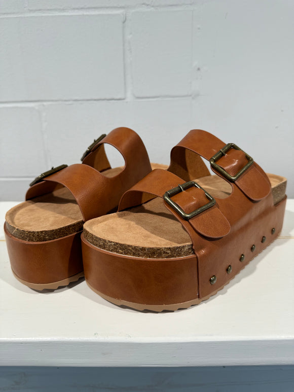 Tan studded two strap wedge