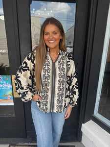 Off white printed long sleeve blouse