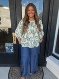 White floral blouse