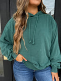 Dark green knit sweater with hood