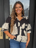 Black and cream printed top