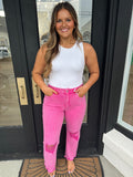 Hot pink distressed cropped flares