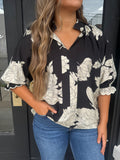 Black and cream printed top