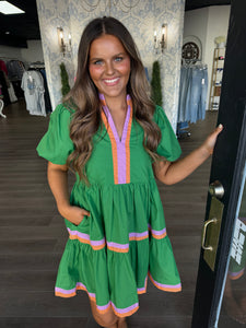 Green colored trim dress