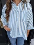 Light blue striped button front top