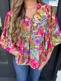 Printed blouse with bubble sleeves & neck tie