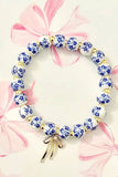 BOW CHARM FLORAL PORCELAIN BLUE BRACELET | 80B1355: Gold